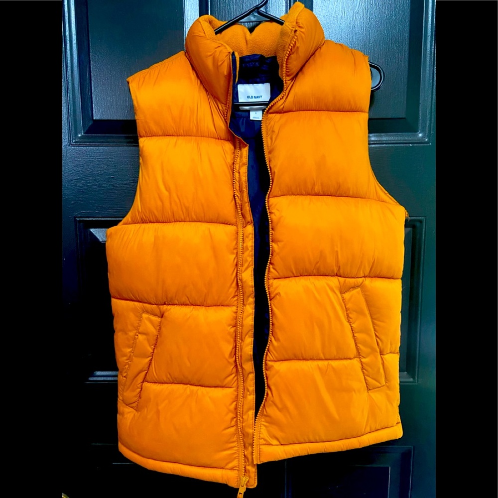 Yellow. Puffy vest. Excellent condition. Only worn once for a shoot. Size S.